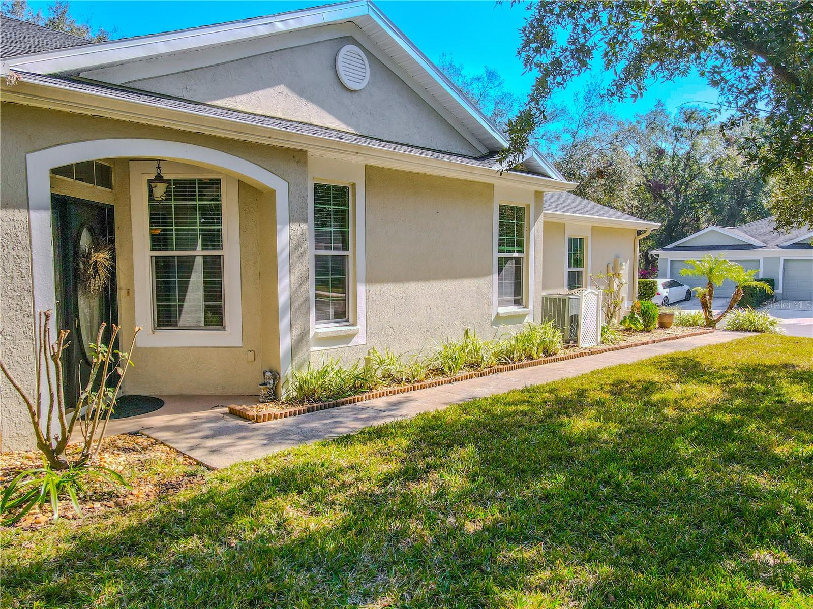 Sidewalk to the front door.