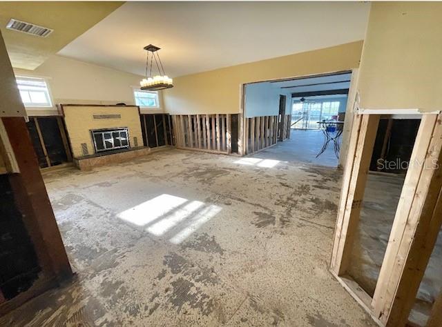 Dining room off the kitchen, with wood burning fireplace