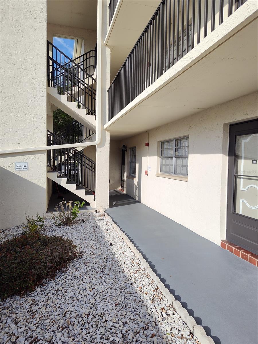 Walkway to front door of unit