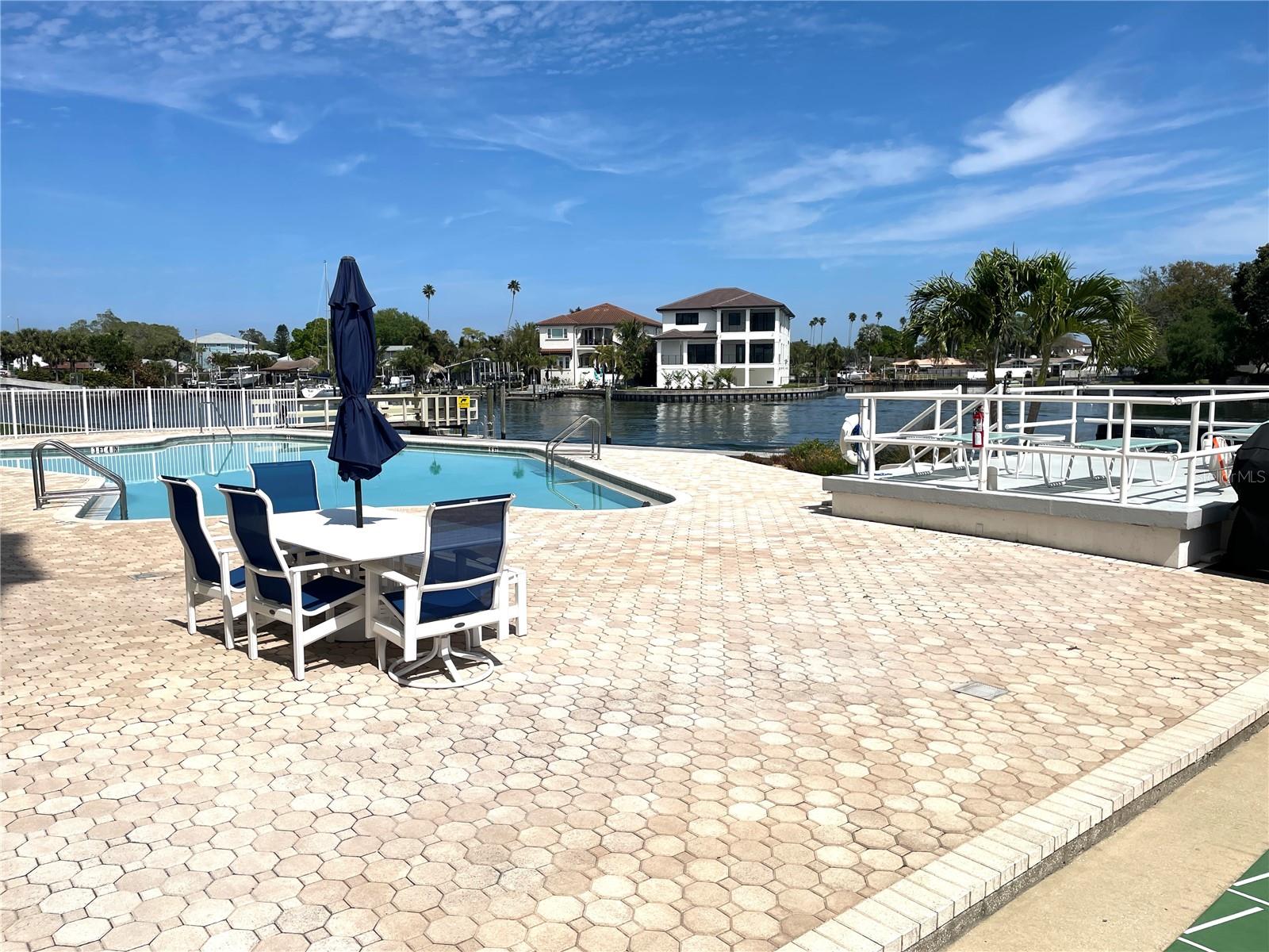 Large pool paver pool deck