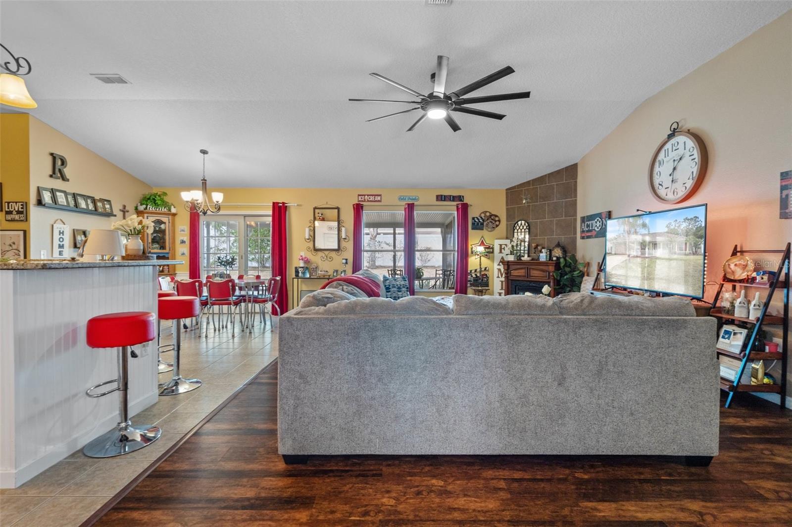 View of the family room and granite breakfast bar