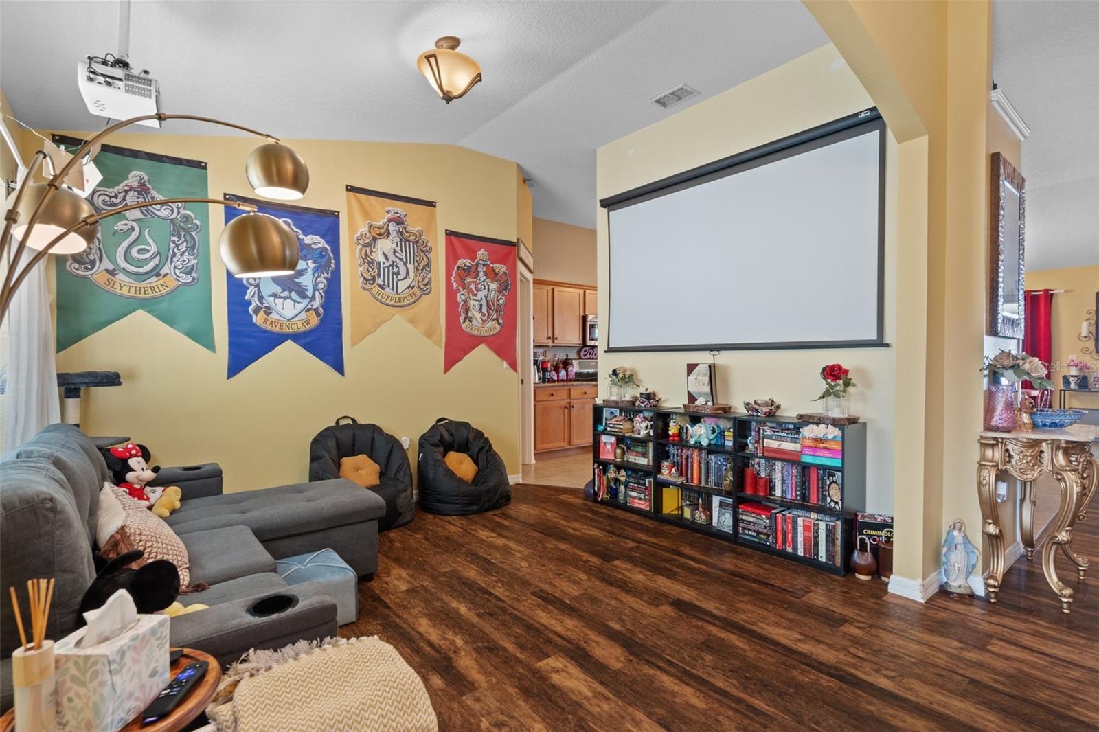 The formal living room is being used as a theatre room