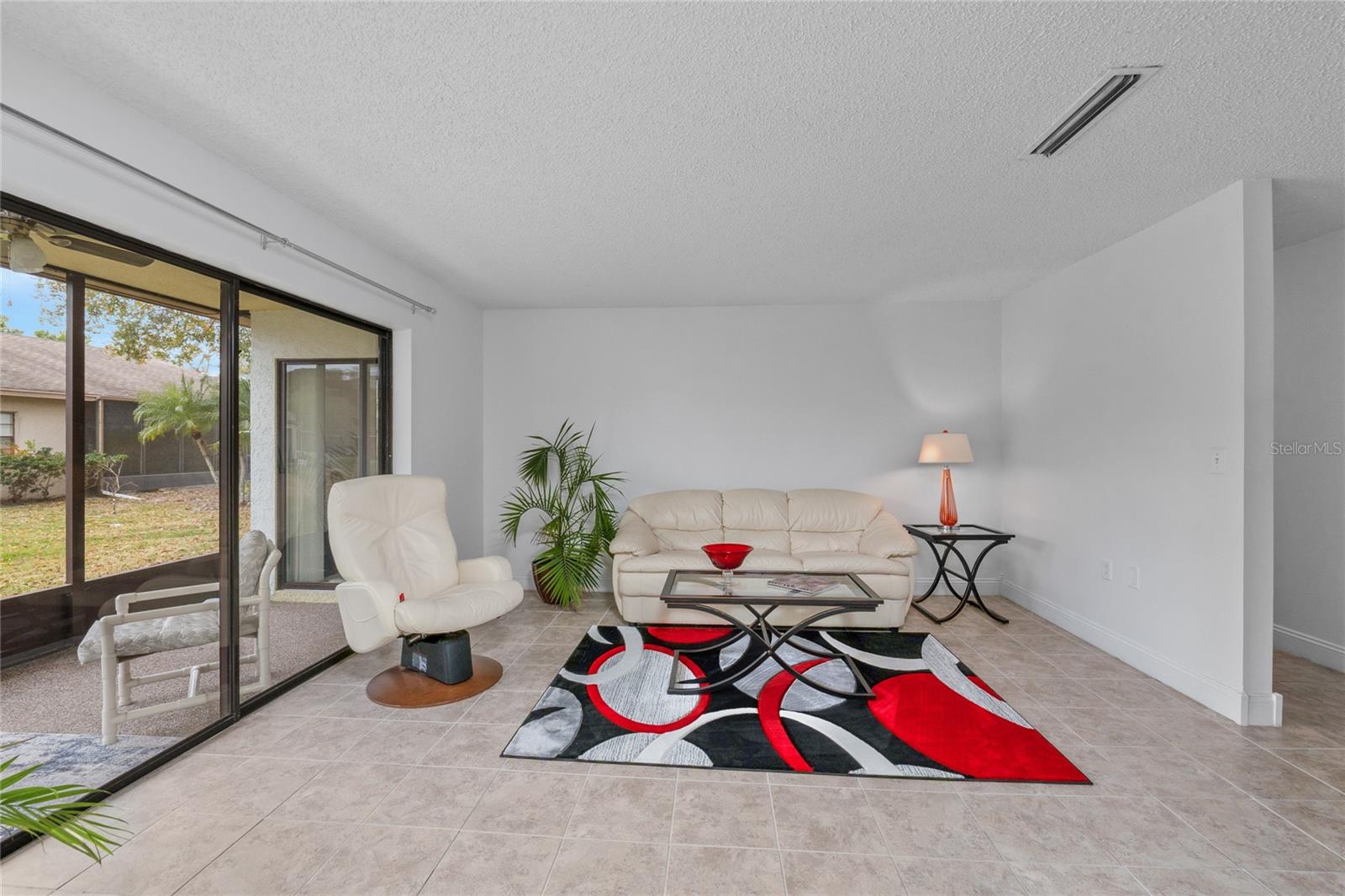 Primary Bedroom with access to the HUGE Florida room