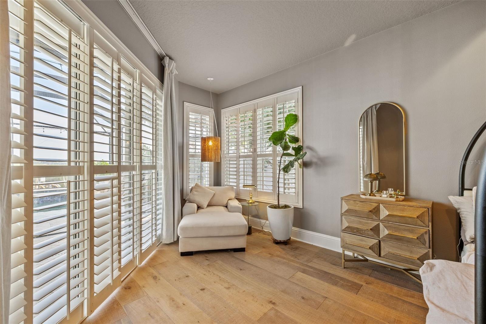 Primary Bedroom sitting area with pool access