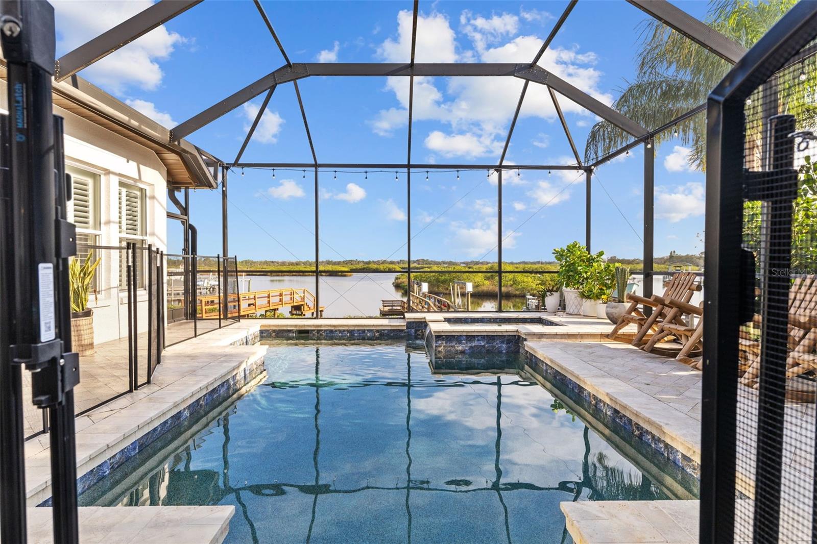 Heated Pool and Spa overlooking the water