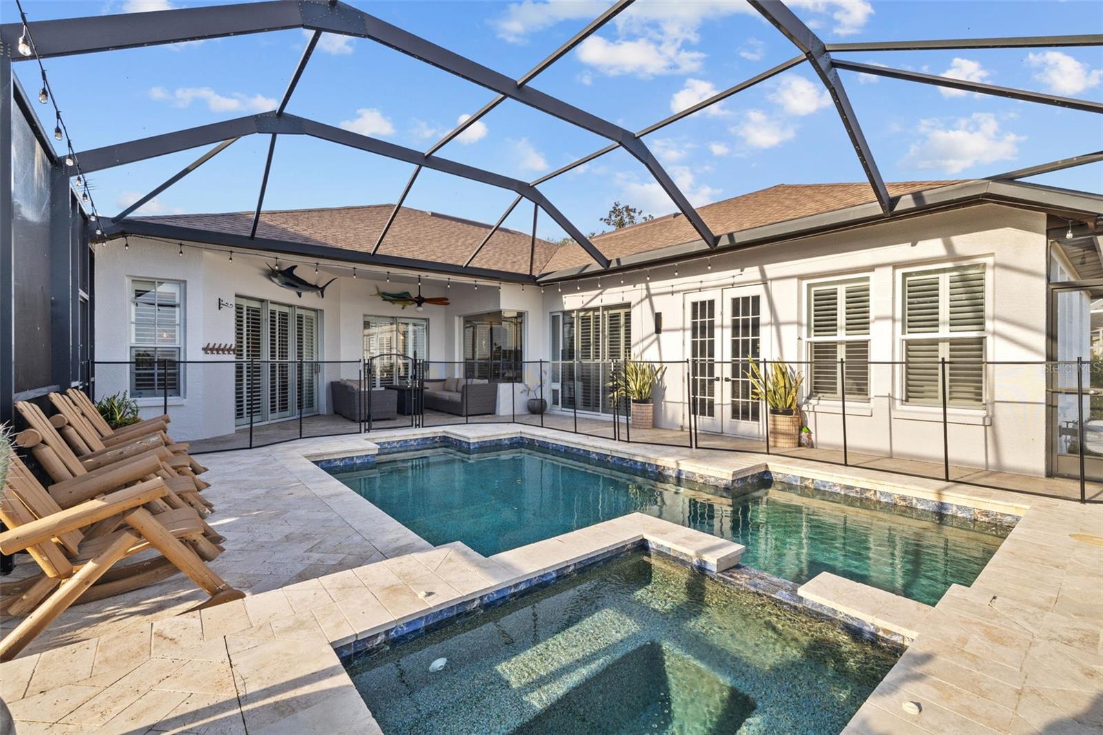 Heated Pool and spa overlooking the water