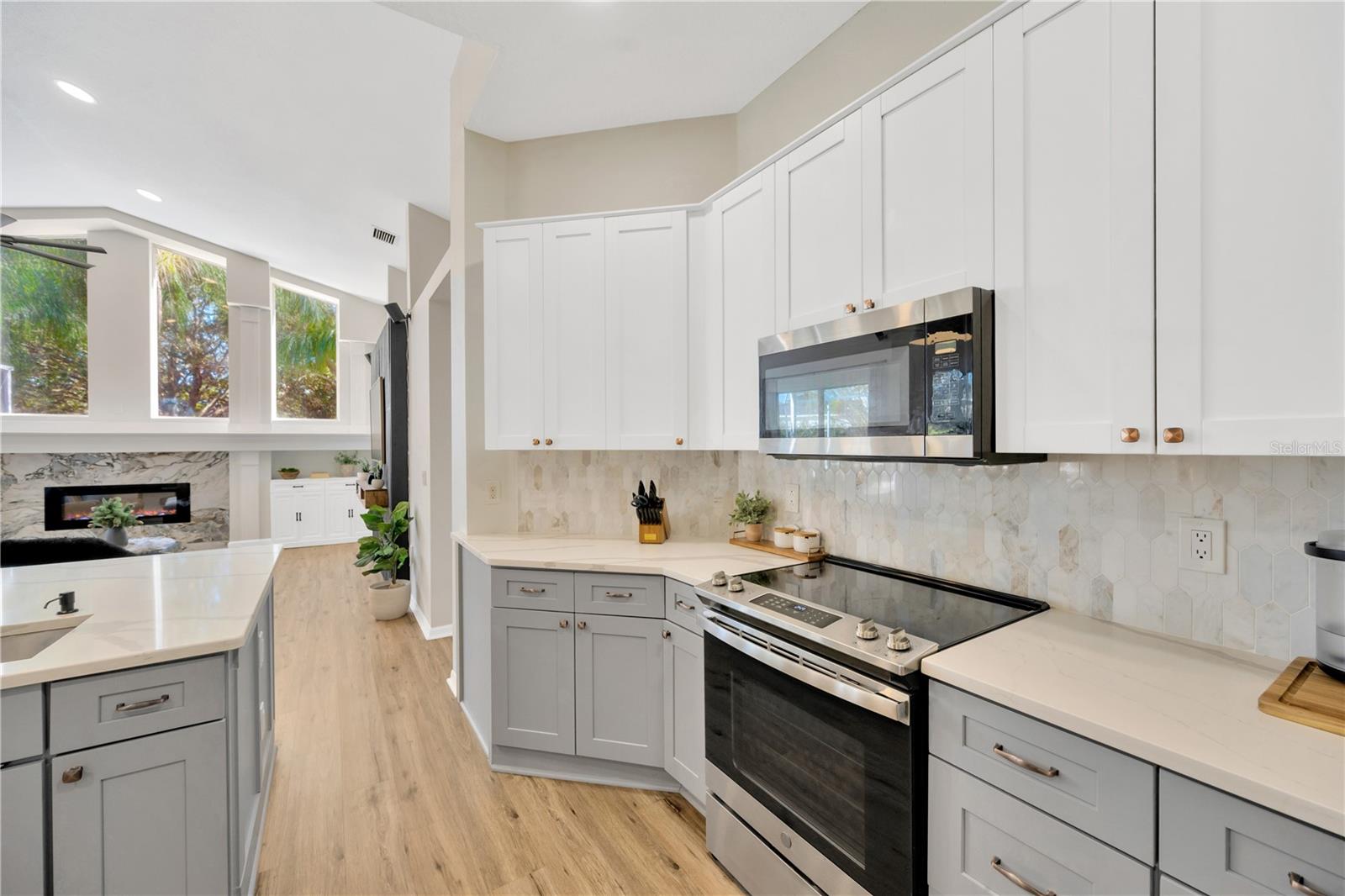 There is seamless connection and flow between kitchen and family room.