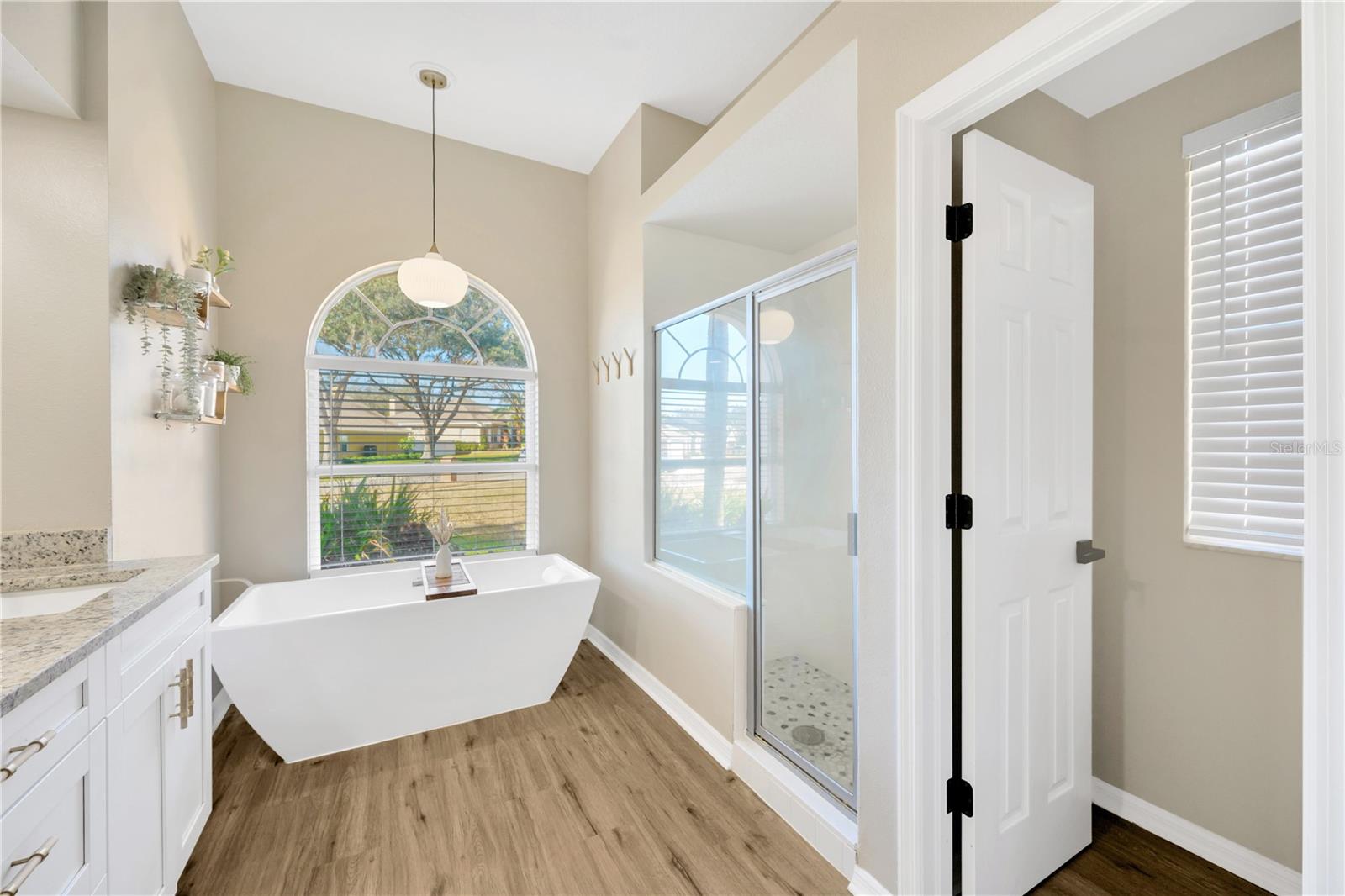 The spa-like retreat also has a spacious shower, a private water closet and 2 closets to store your clothes:  a built-in closet plus a large walk-in closet.