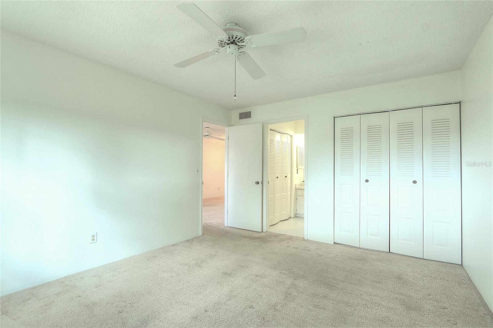 The large master bedroom boasts two large closets.