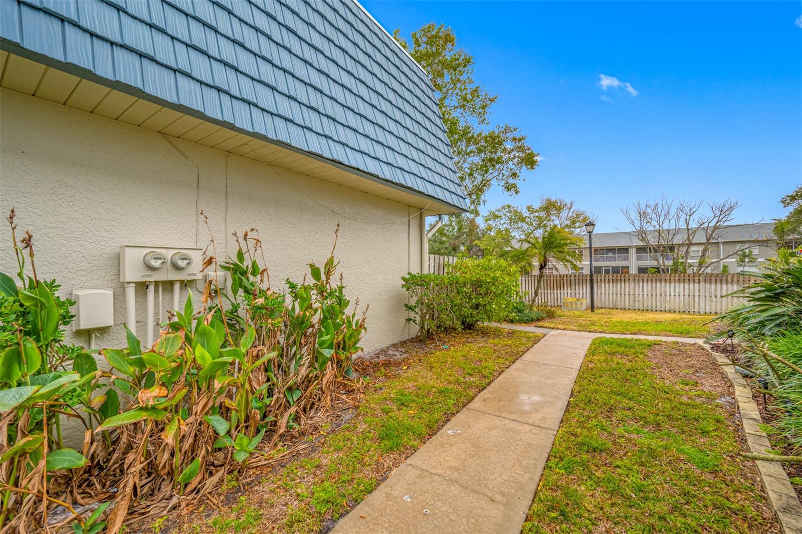 Walkway to unit 14525 in back of building