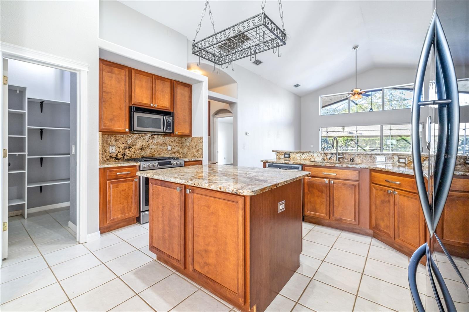 Kitchen w walk in pantry