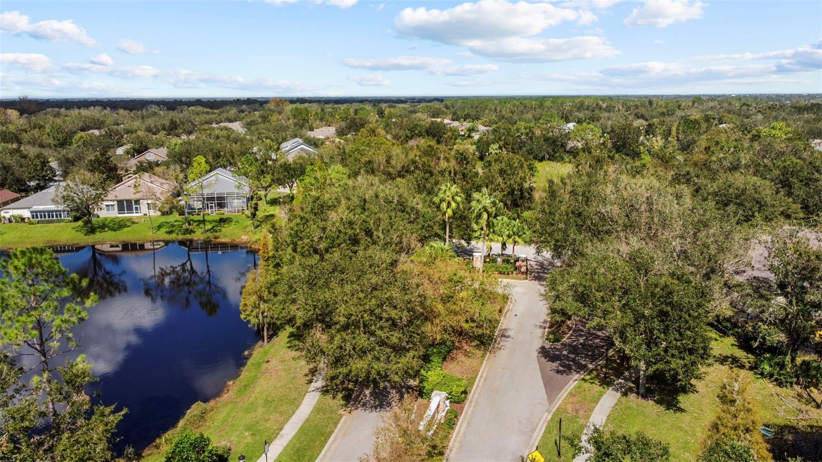 Gate/ pond view. Property is 2nd in from the left