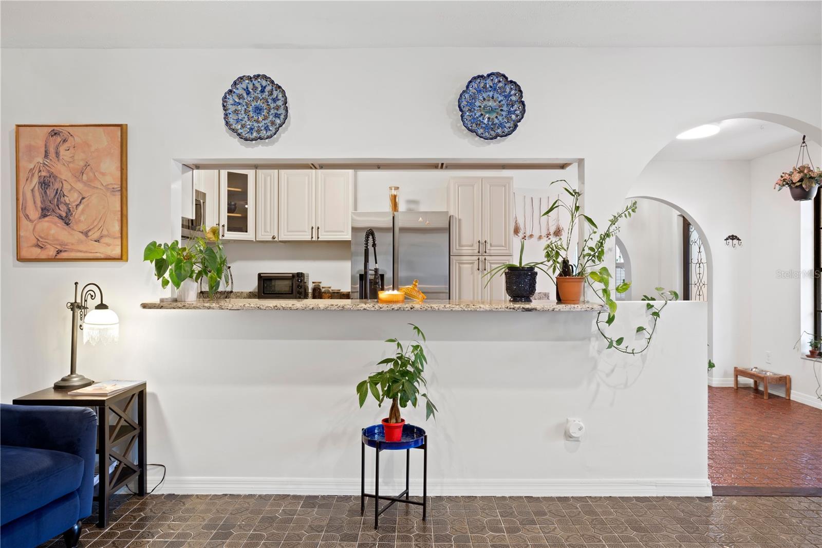 Kitchen opens to formal dining room