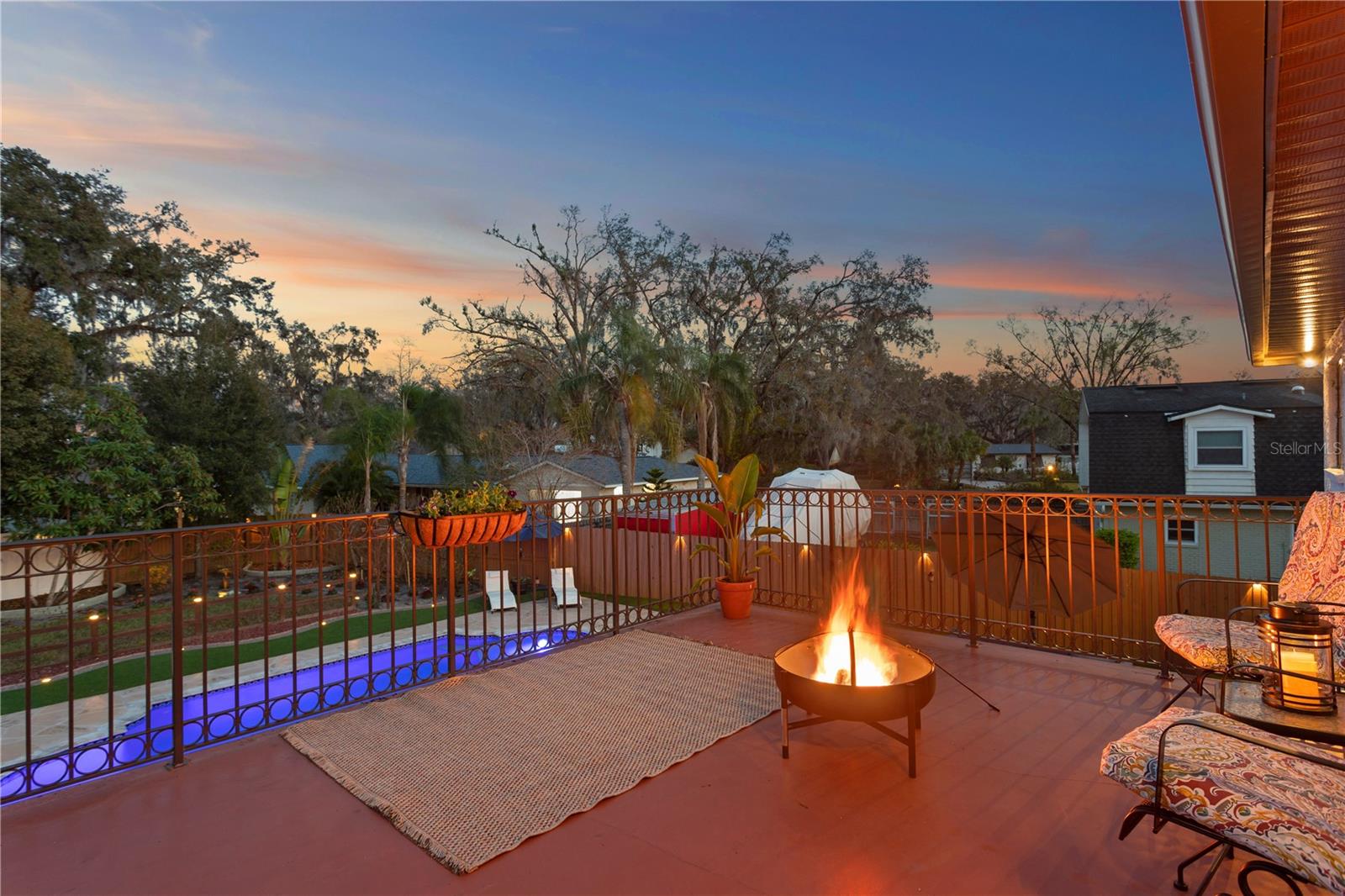 Step outside your private Juliet balcony to an entertainers paradise, where a custom fire pit lounge invites conversation beneath the stars.