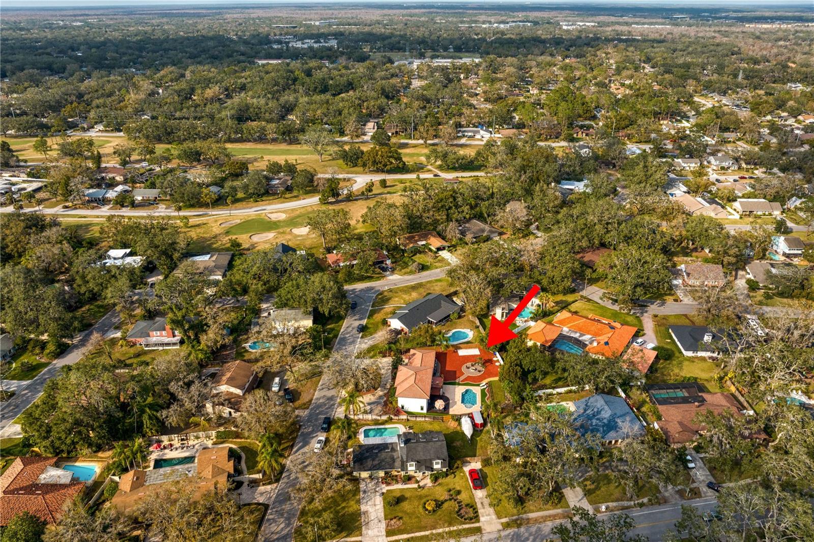 Aerial view of home and surrounding community