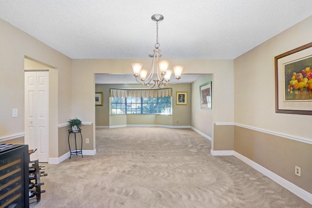 Formal Dining Room with view into Living Room