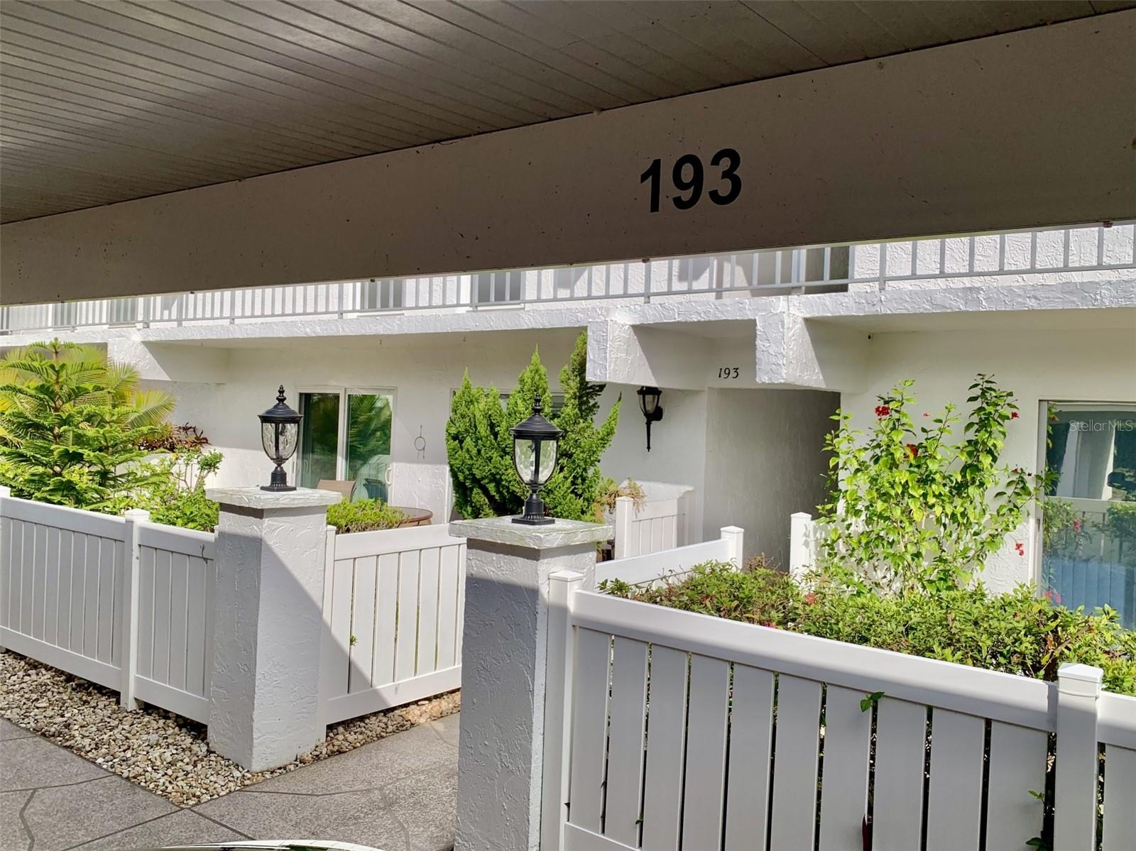 1 carport space is assigned and in front of the unit.