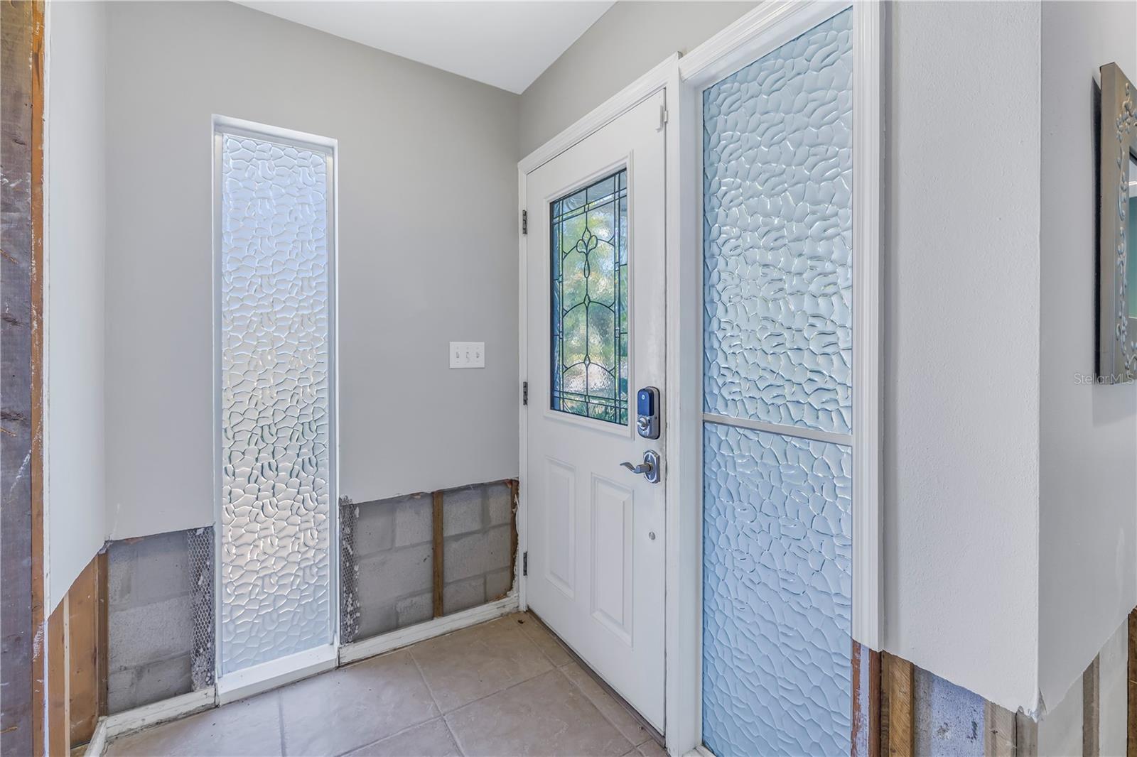 Foyer entry with coat closet