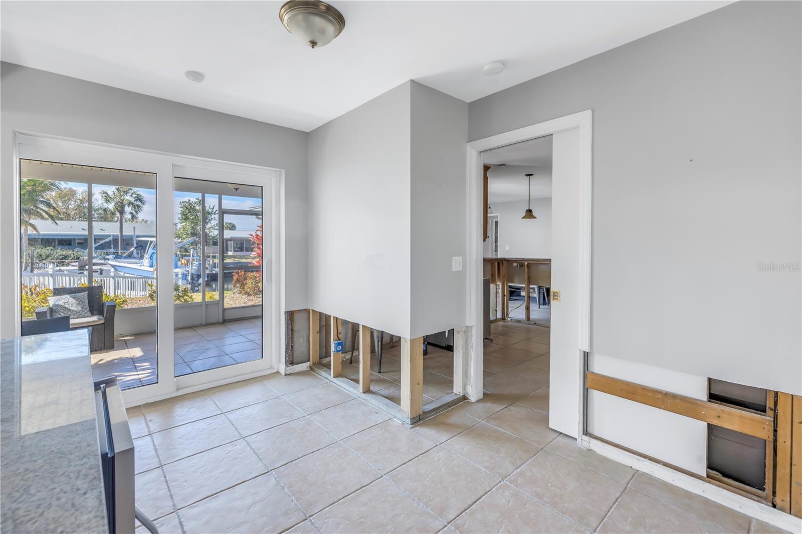 Dining area with hurricane rated sliding doors