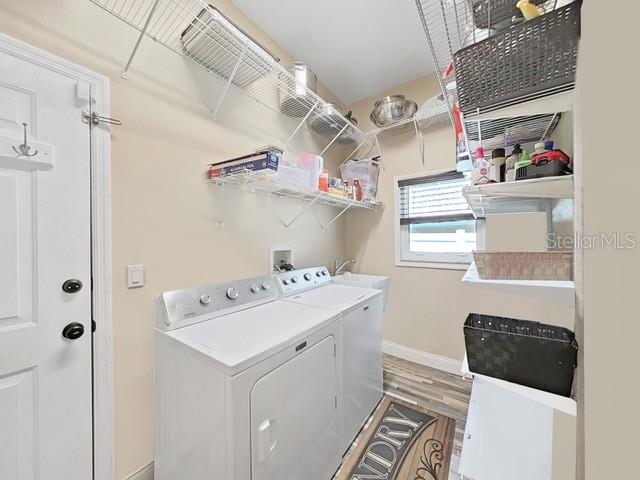 Laundry/Utility Room off garage leading into kichen