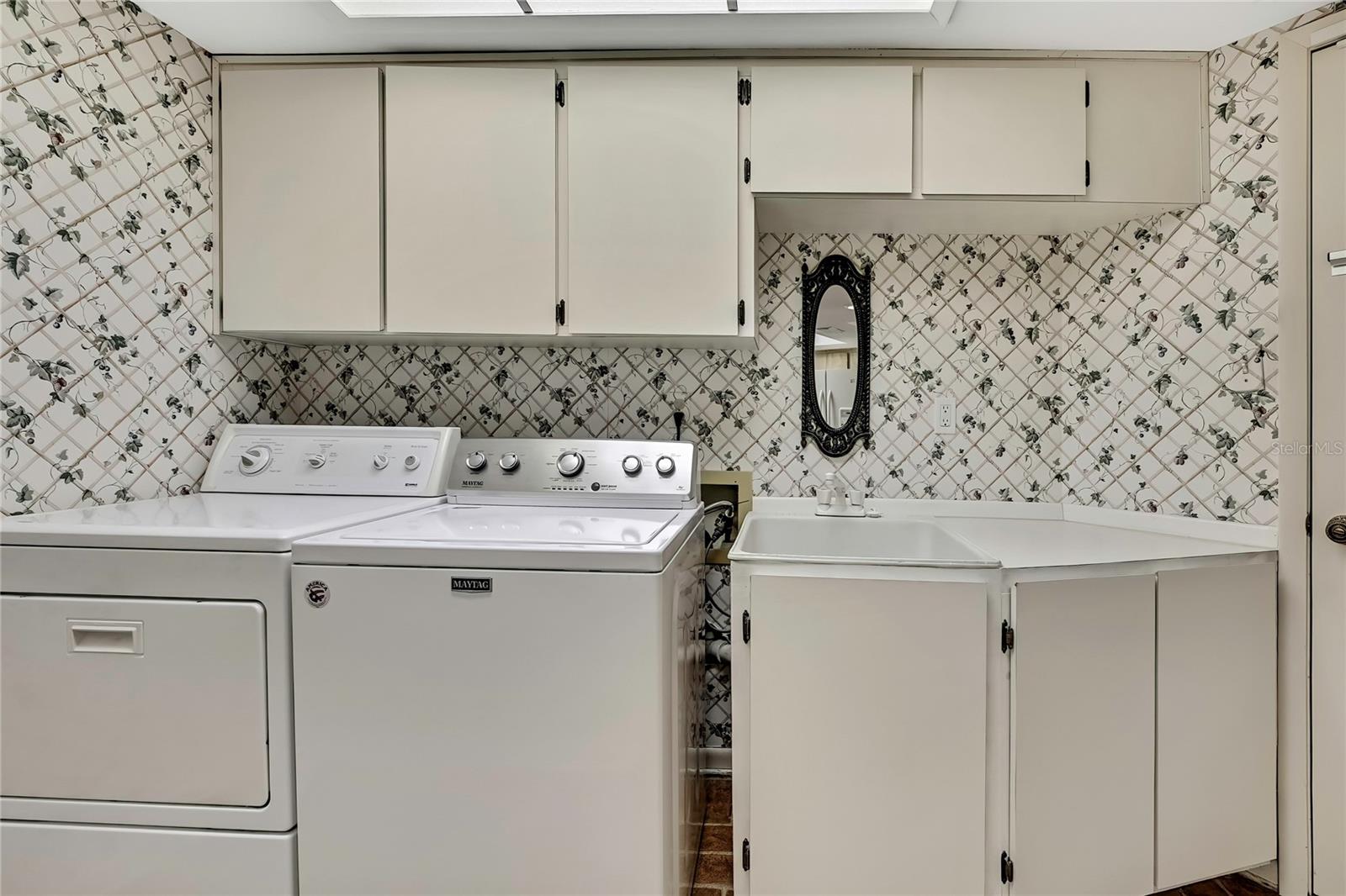 Large Laundry Room leading out to the garage.