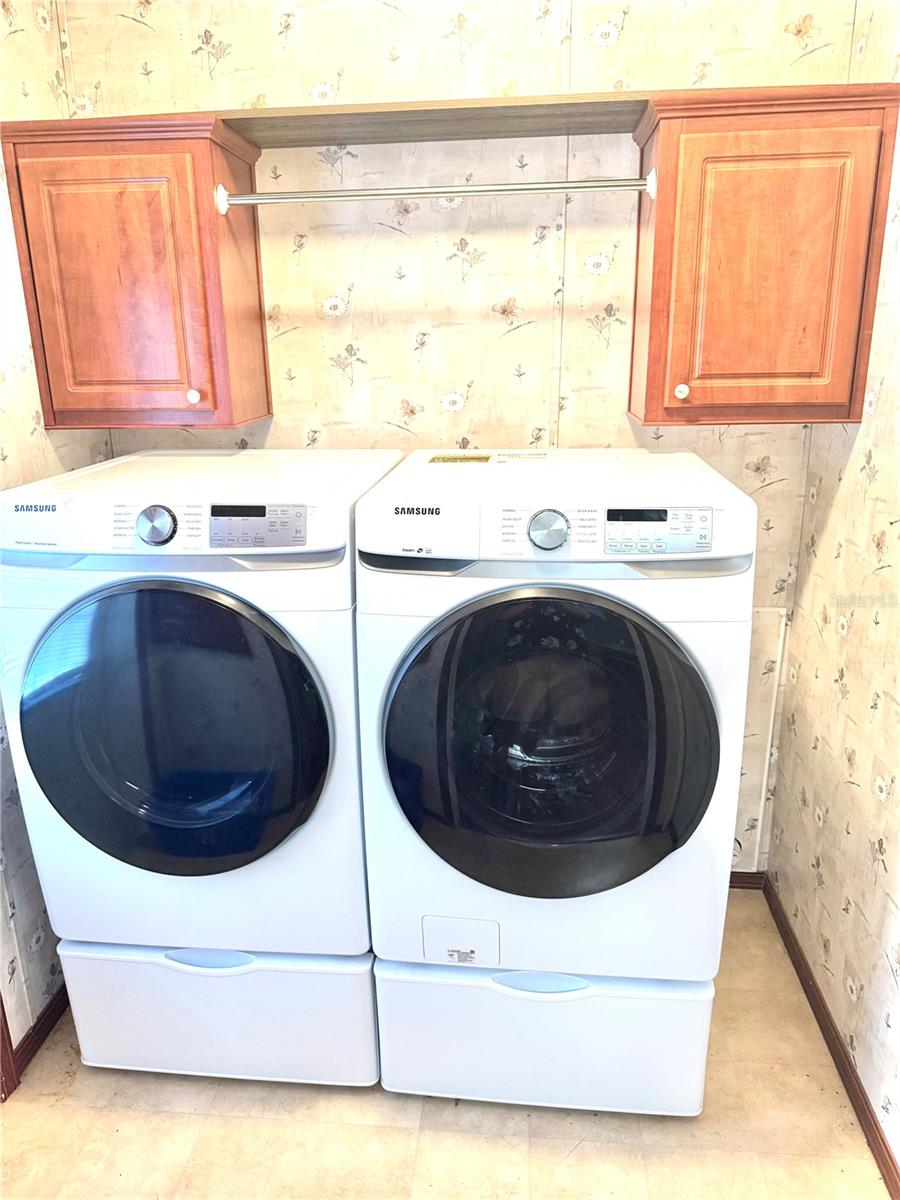 Laundry room off the kitchen.  Nice appliances