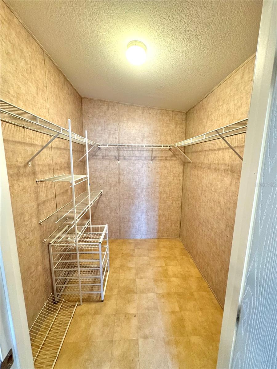 Huge walk in closet in the primary bedroom