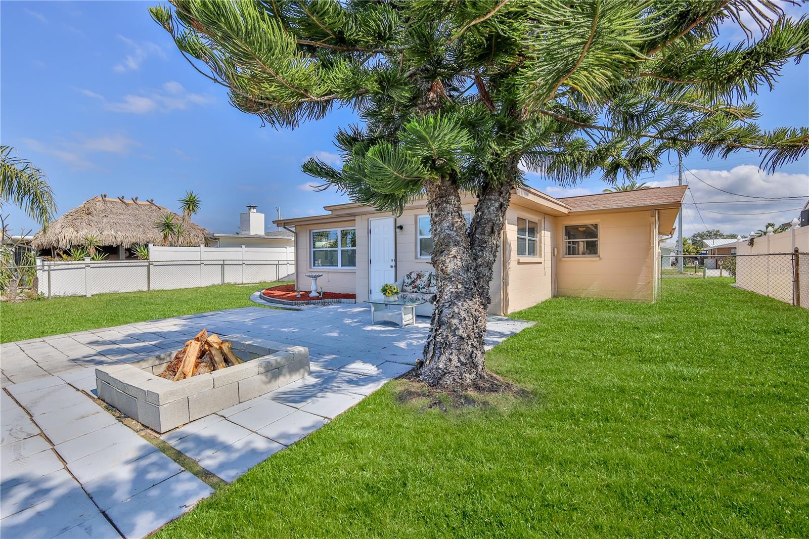 Stunning back yard!  Grass virtually enhanced.