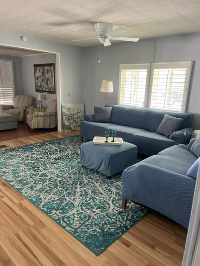 LIVING ROOM WITH PLANTATION SHUTTERS