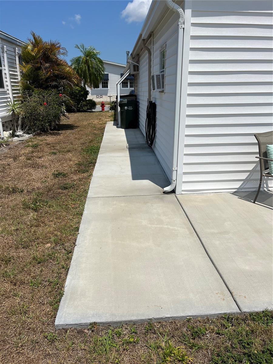 SIDEWALK TO PATIO AND TO FRONT OF HOME