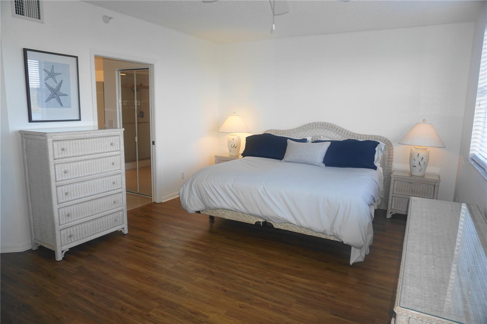 The primary en suite features 2 walk-in closets . . .