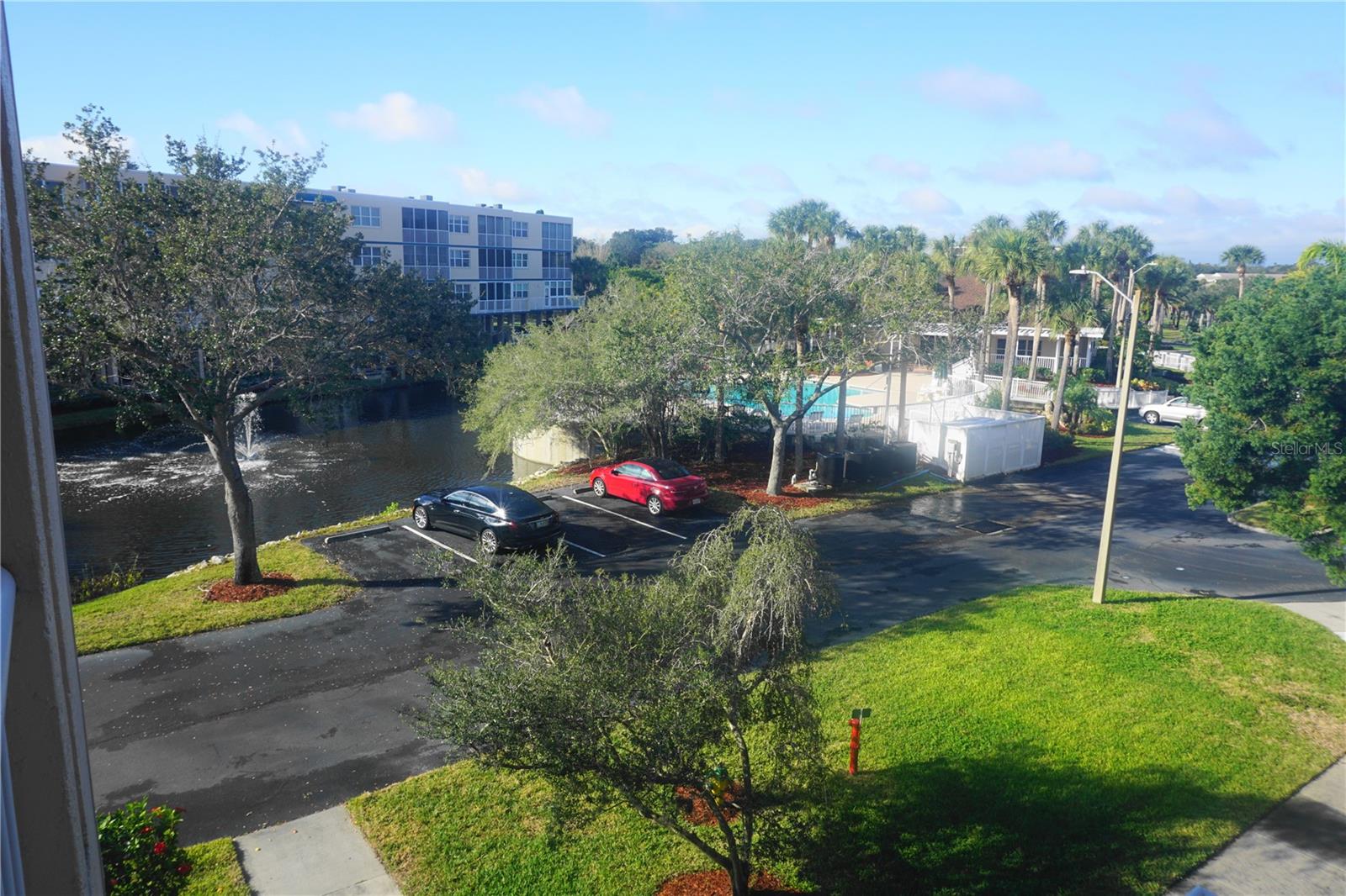 Clubhouse and main pool and spa from condo front door