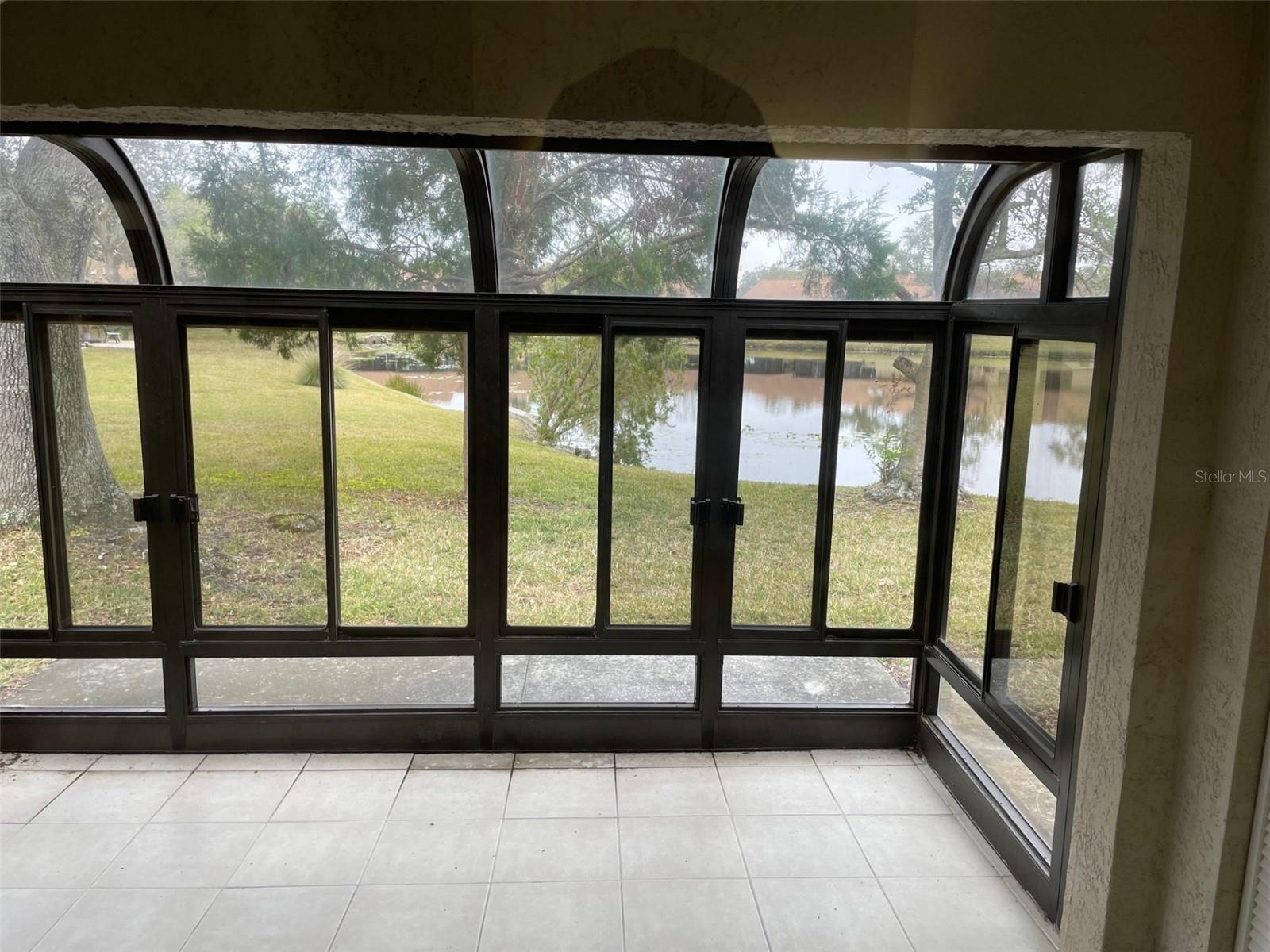 Enclosed patio w/ view to pond 2