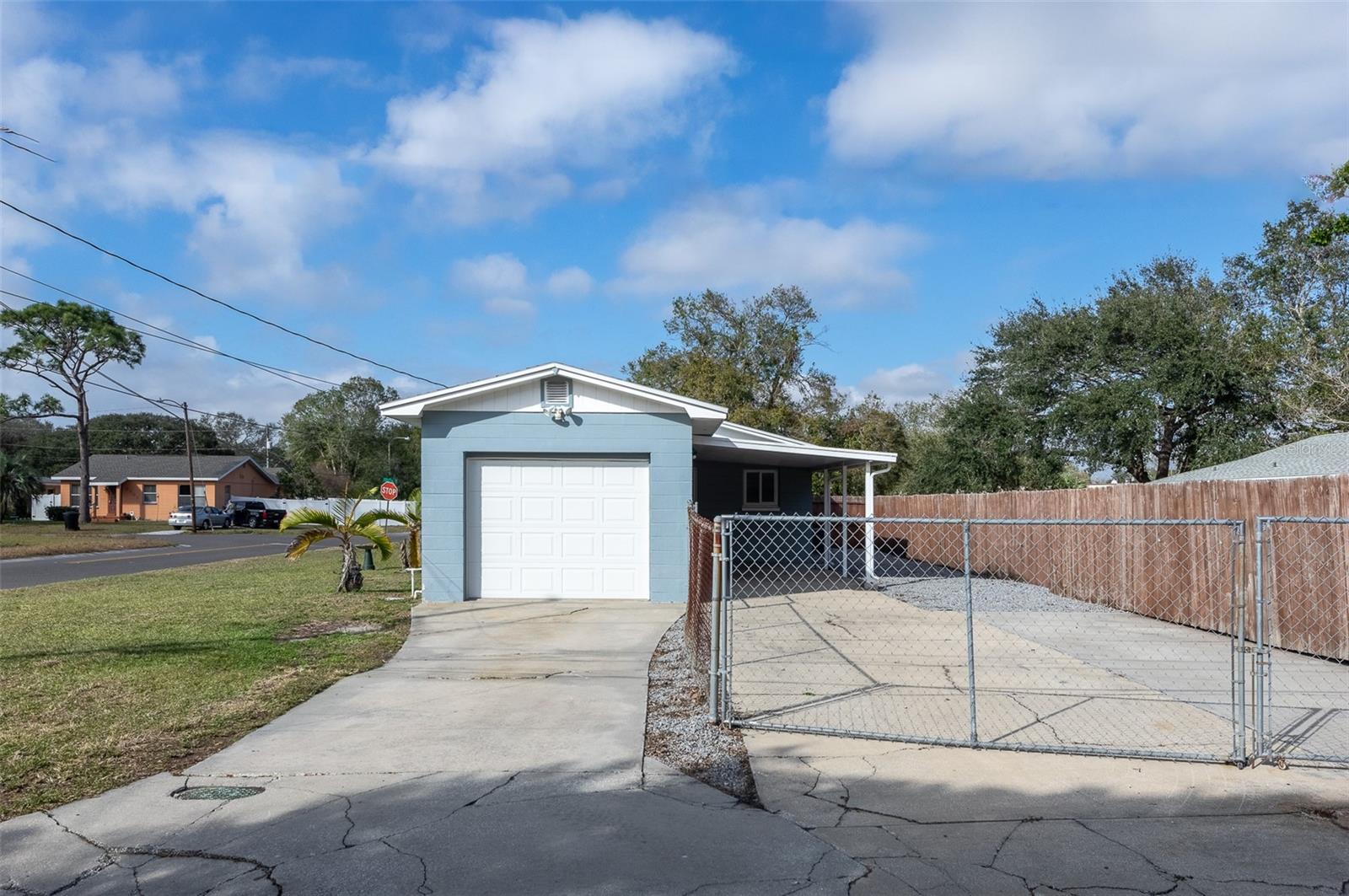 Garage with Alley Access and Fenced in Backyard