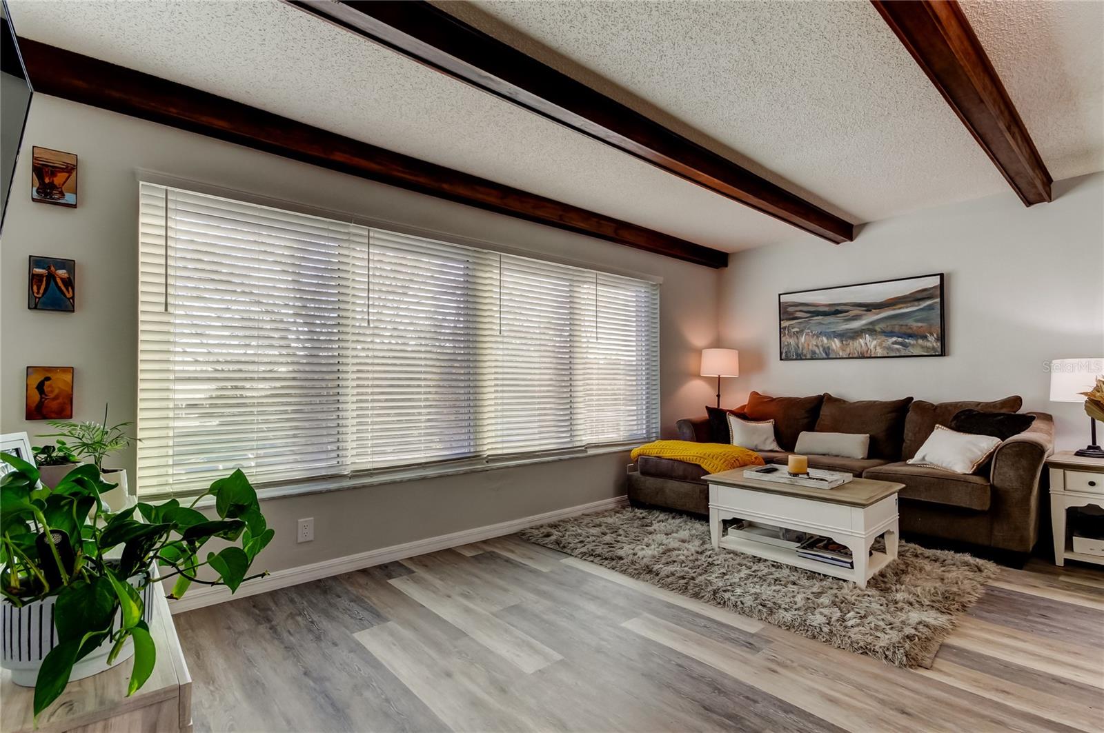 Family Room has beamed ceiling