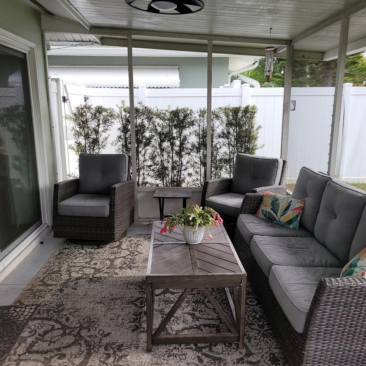 Screened in Back Porch, so comfy to read / relax.