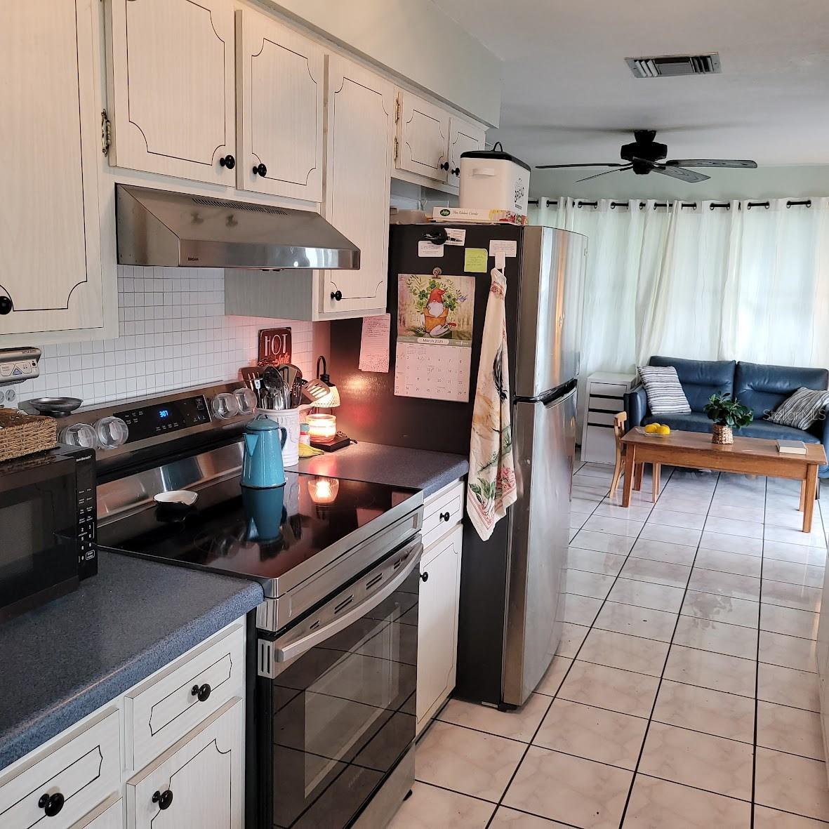 The 8X10 Galley kitchen is just off the dining room .