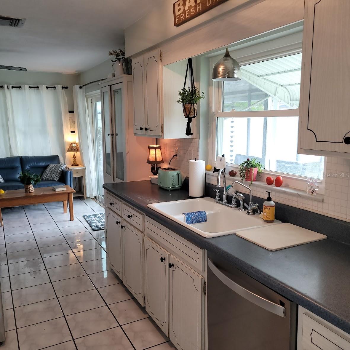 The farmhouse sink in this kitchen has been enjoyed over the years. Perhaps it will be a perfect fit for you as well.