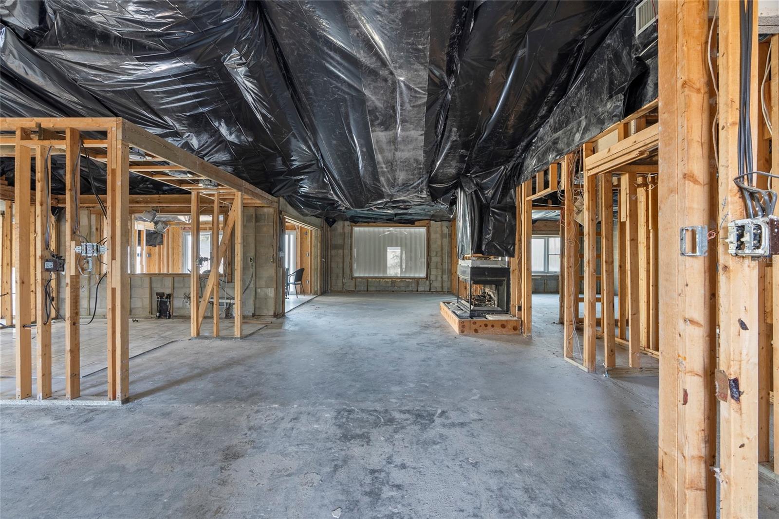 Hurricane Milton tore off the roof of the back porch and left the home exposed to the storm.  The home was professionally remediated to the ceiling