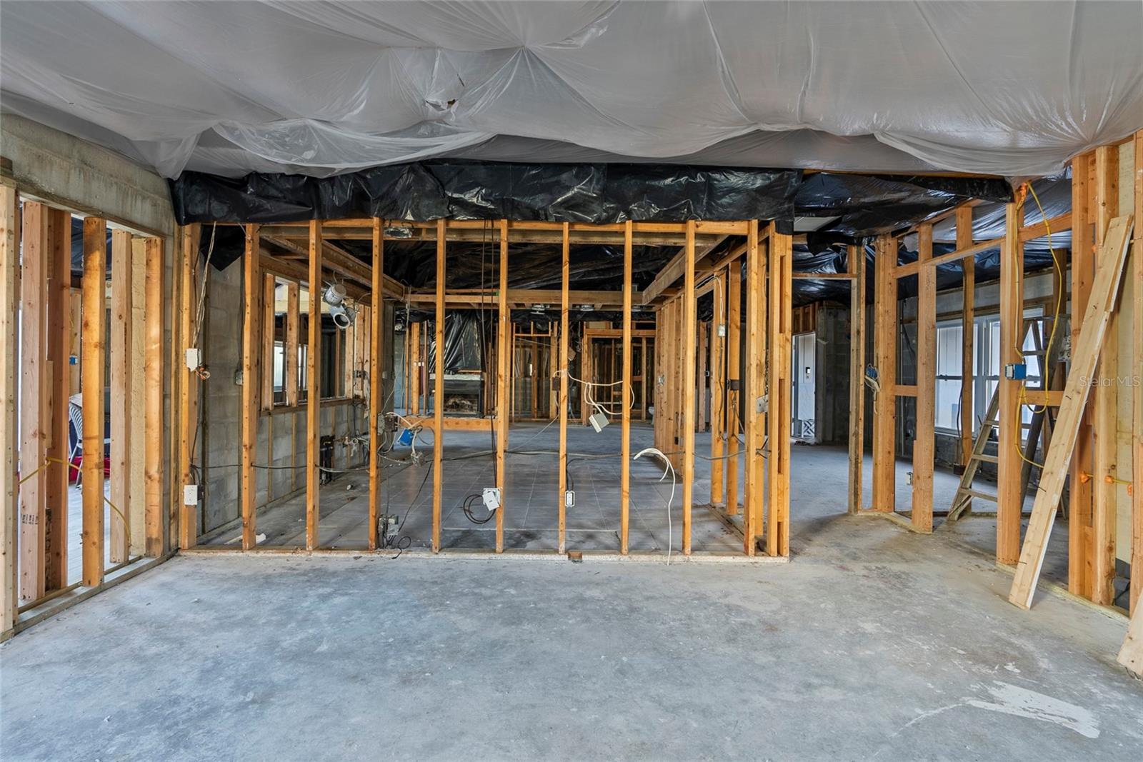 Hurricane Milton tore off the roof of the back porch and left the home exposed to the storm.  The home was professionally remediated to the ceiling