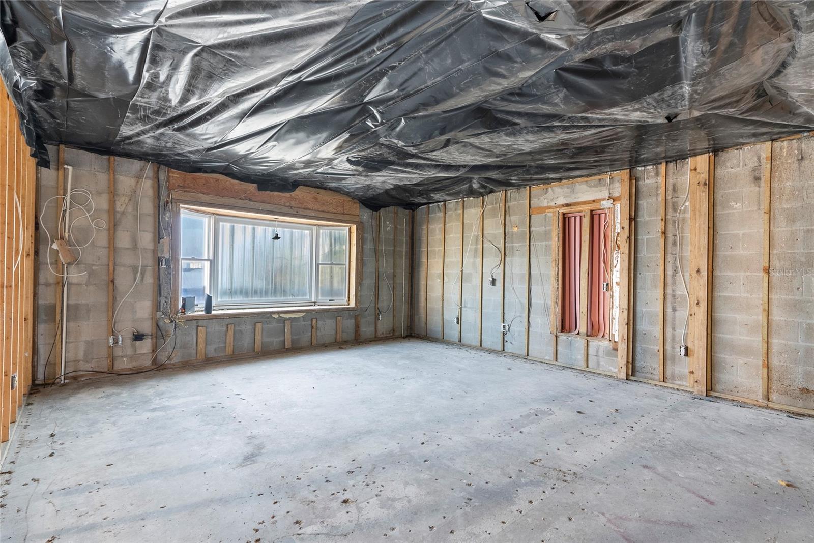 Hurricane Milton tore off the roof of the back porch and left the home exposed to the storm.  The home was professionally remediated to the ceiling