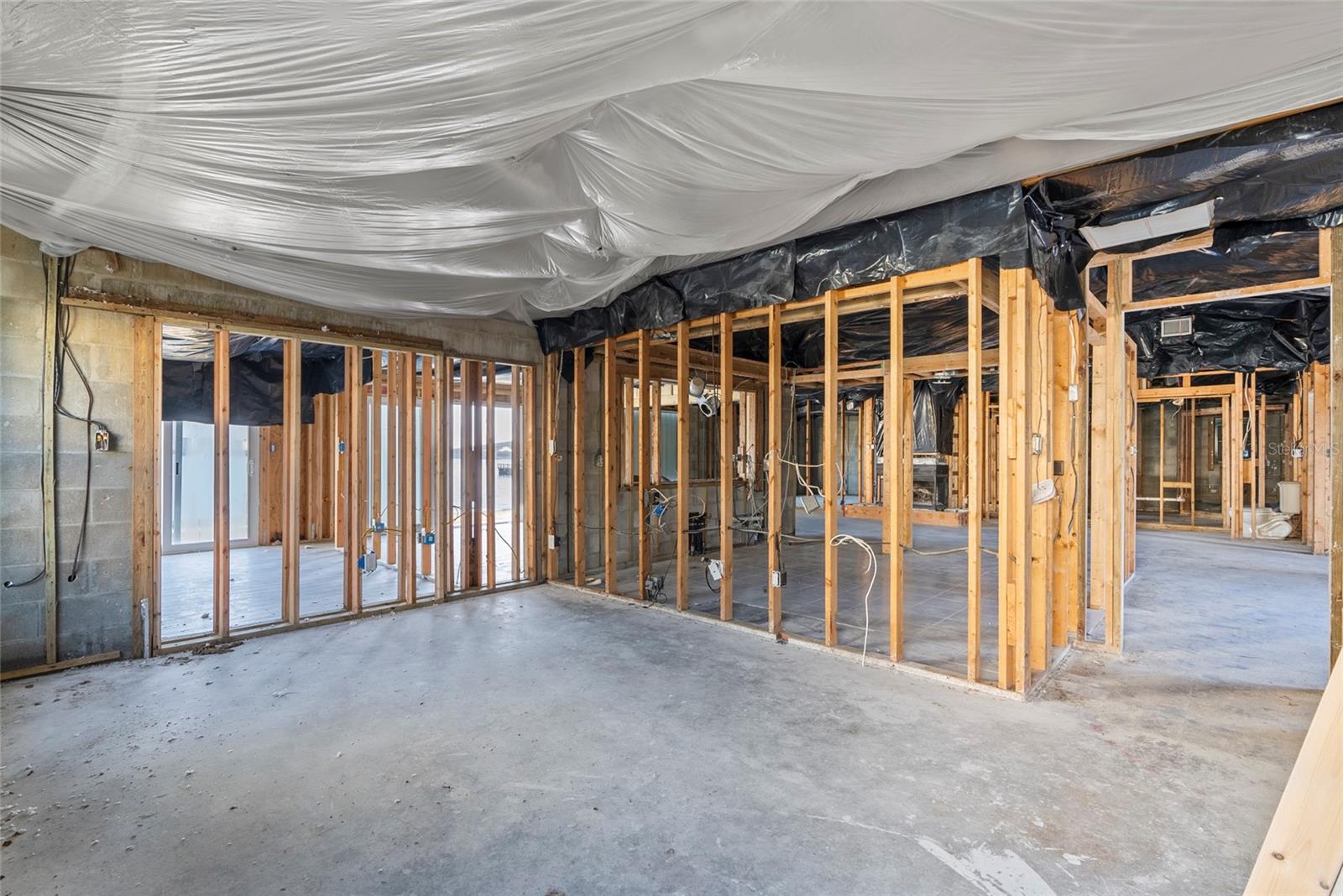 Hurricane Milton tore off the roof of the back porch and left the home exposed to the storm.  The home was professionally remediated to the ceiling