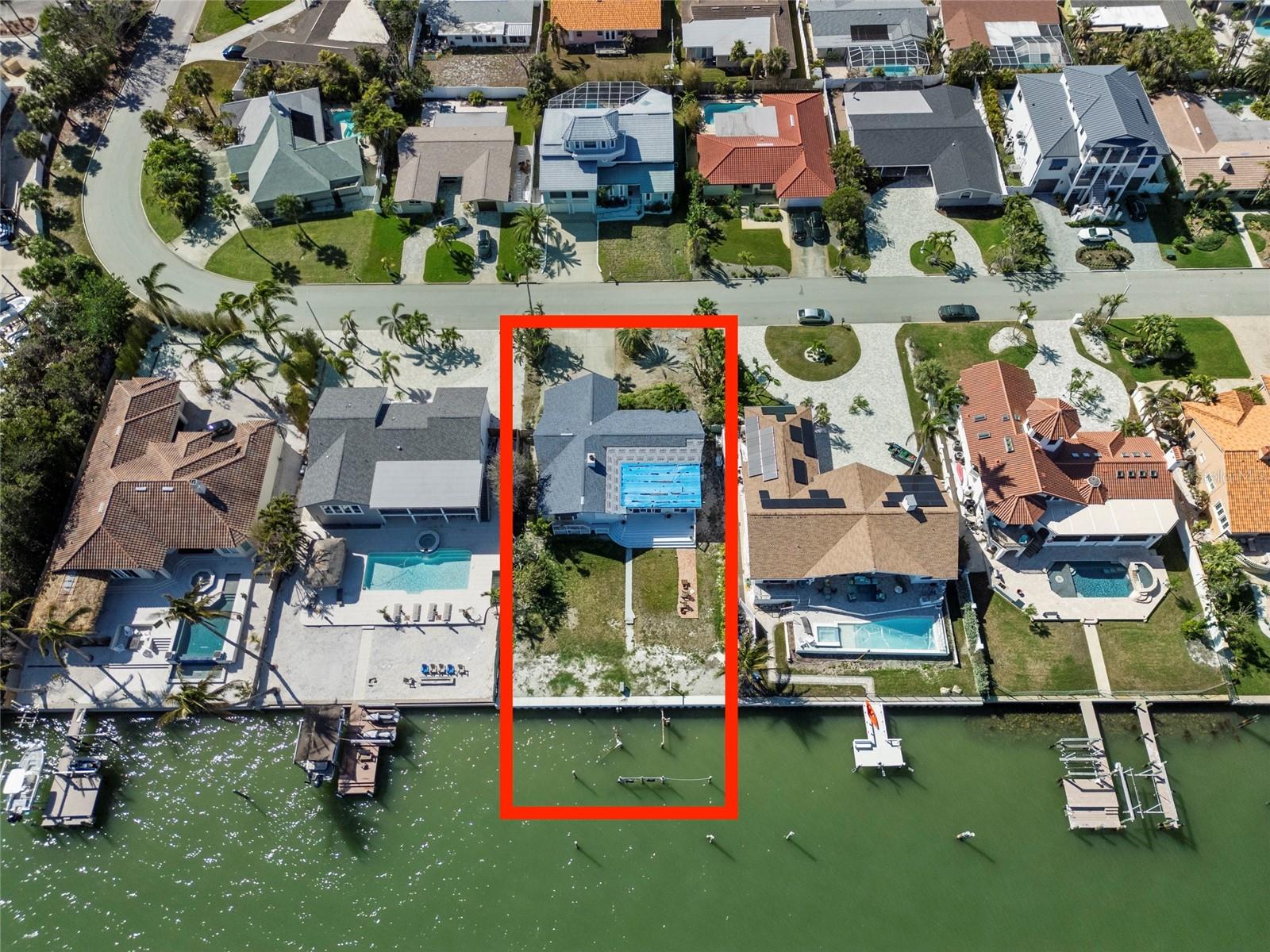 The lot measures 85 x 150 with 85 feet of water frontage and features a brand new sea wall