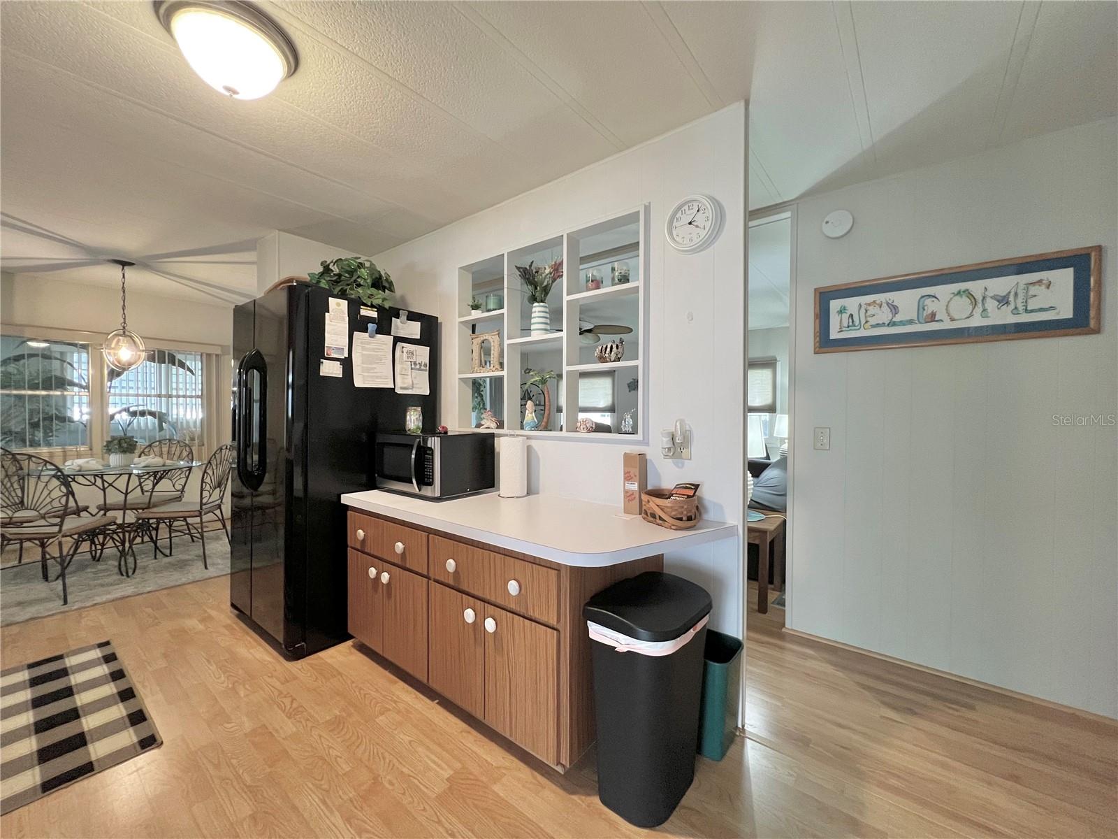 Kitchen with Island and pass through to living room