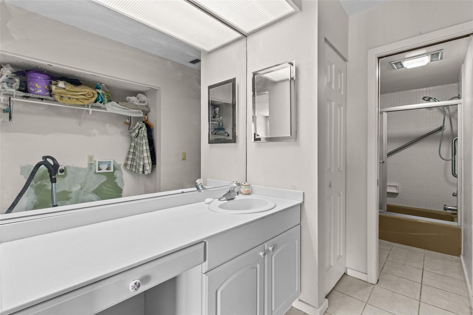 The ensuite bathroom is ready for a refresh, offering endless potential to be transformed into a beautifully designed, personalized space."The ensuite bathroom is ready for a refresh, offering endless potential to be transformed into a beautifully designed, personalized space."