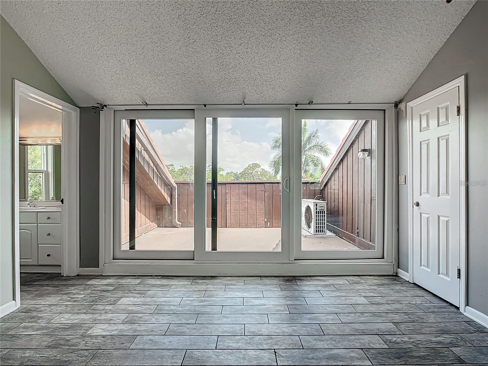 The double-glass sliding doors flood the space with natural light, while the versatile second-floor room offers endless possibilities, ready to be customized for your needs—whether it's a bedroom, office, or creative space.