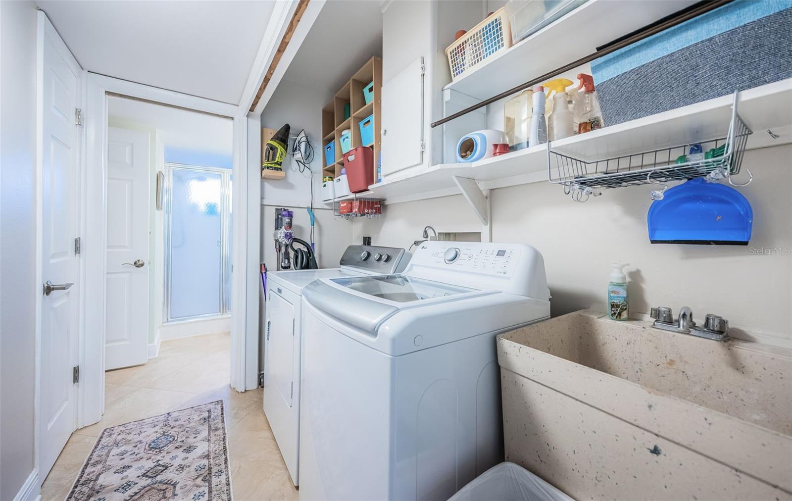 Lower level Utility Room with Full size Washer & Dryer