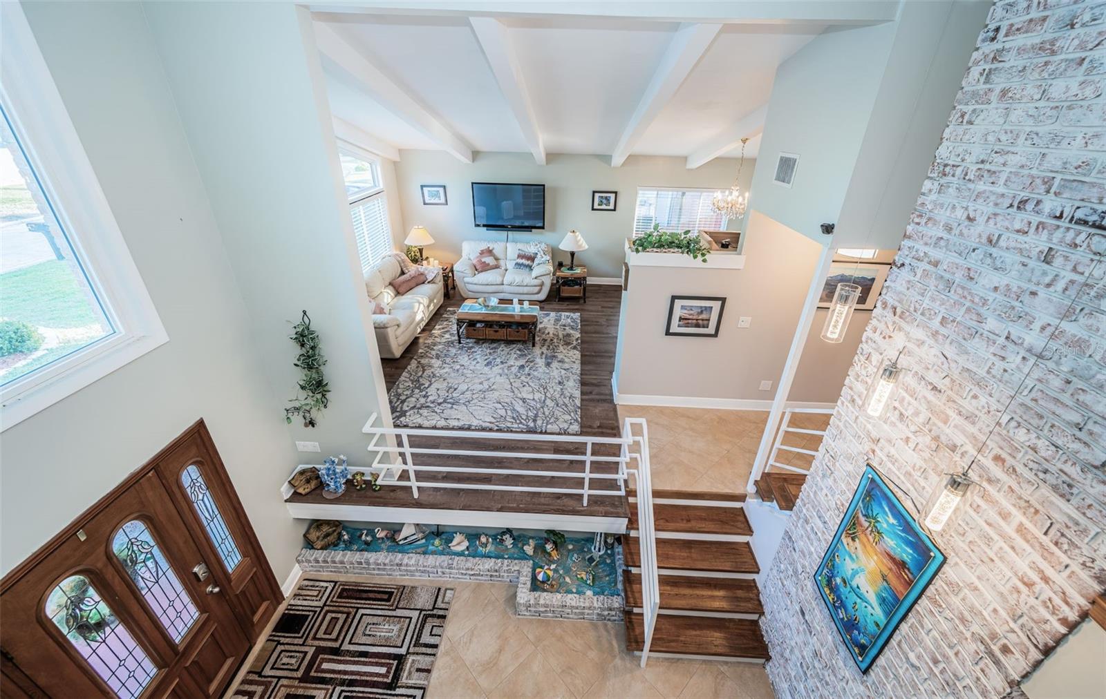 Upper Level Loft looking down into the Living Area