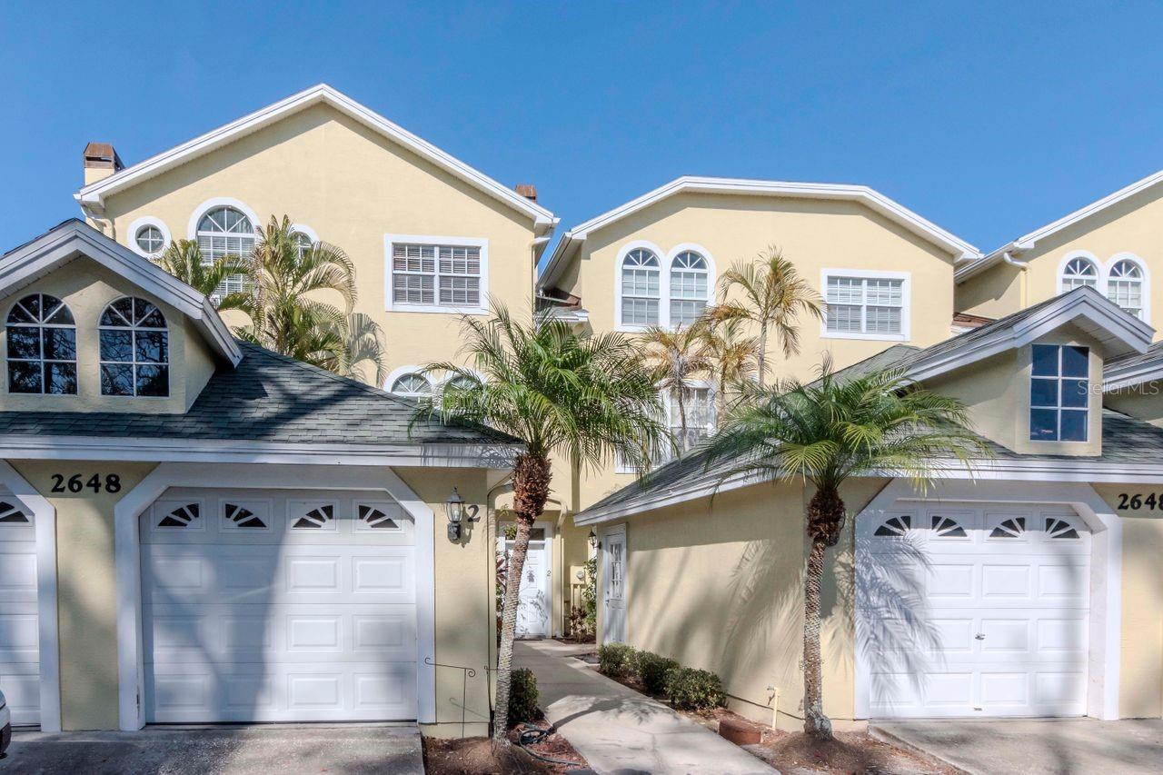 Front view of garage and home entrance