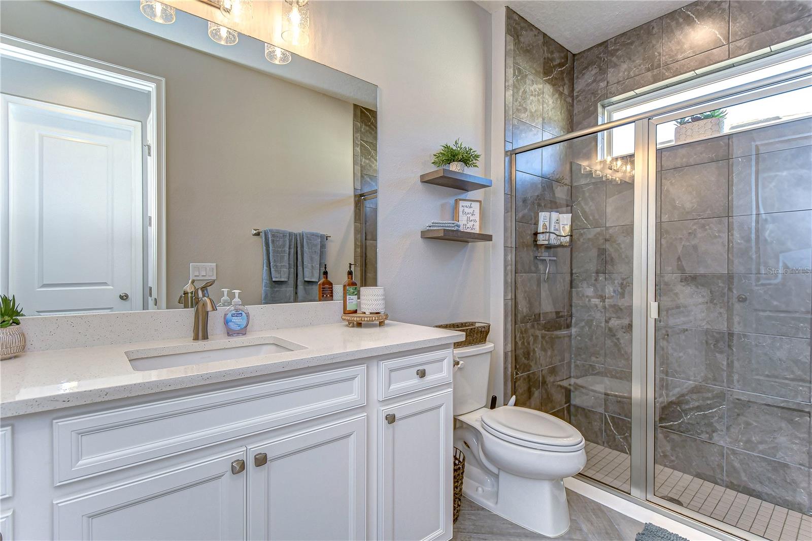 Second bathroom boasts large walk in shower!